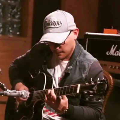 Carlitos In The Guitar