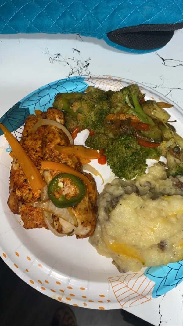  Baked chicken breast, with cheesy garlic mashed potatoes and broccoli with steamed vegetables 