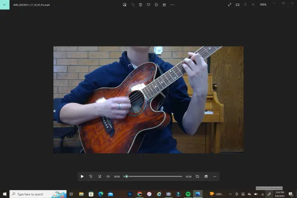 Holding my acoustic electric like a classical