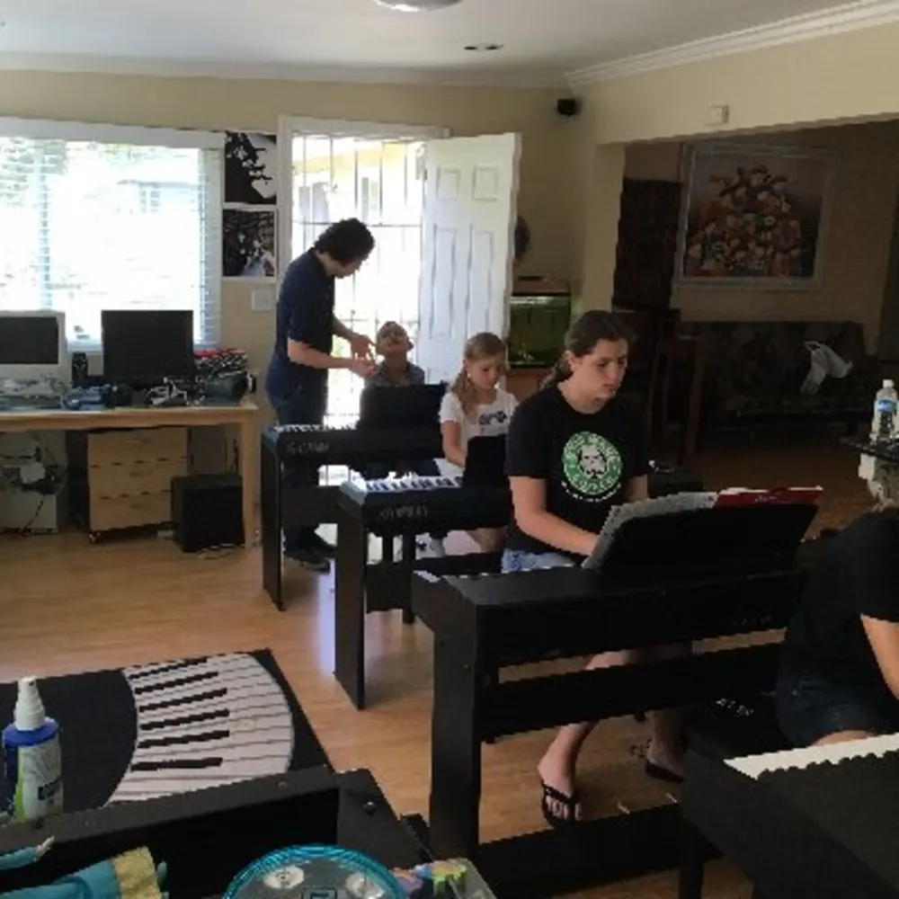 Orange County Music School: Piano, Guitar, Voice, Violin.