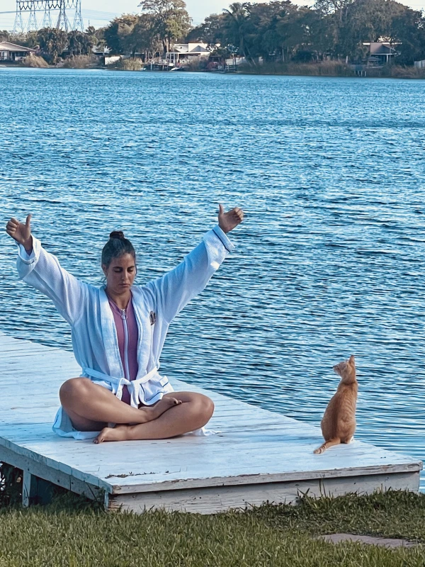 Breath work exercises by the lake