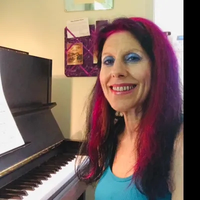 Gfire's Piano, Singing, Folk Guitar, & Songwriting Lessons