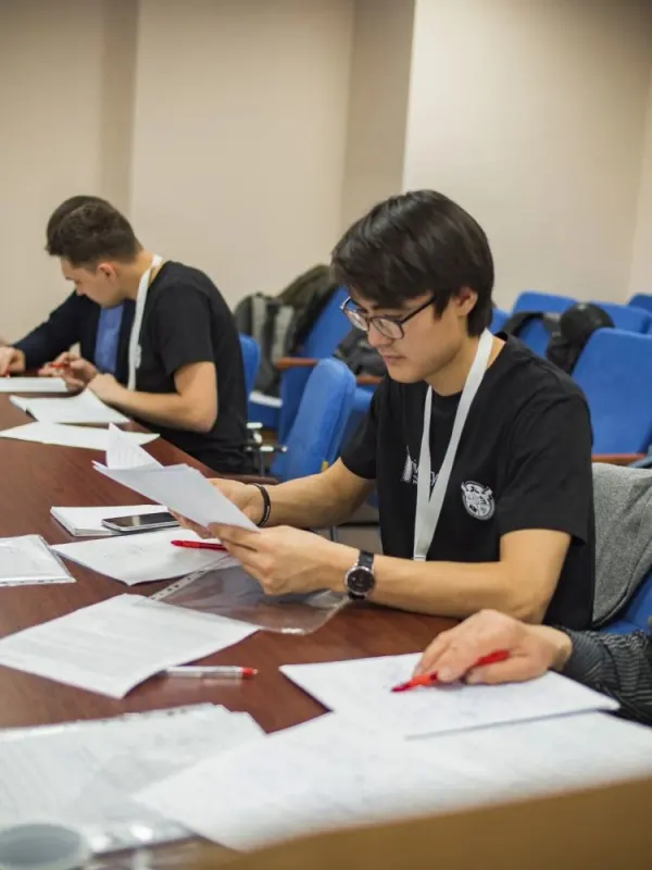 Grading papers at the final round of the All-Russian Physics Olympiad for School Students, Tyumen, 2018.