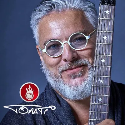 Tomati Guitar Lessons