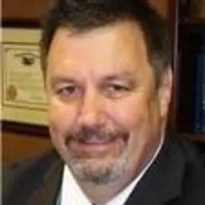 Charles W. Tourdot, Esq