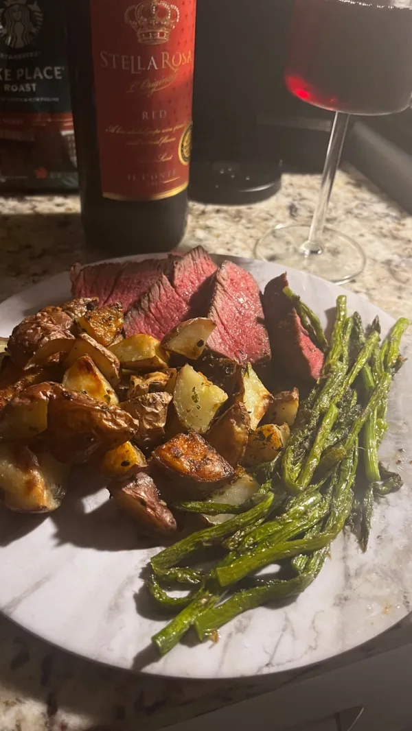 Medium rare filet with garlic and herb pots