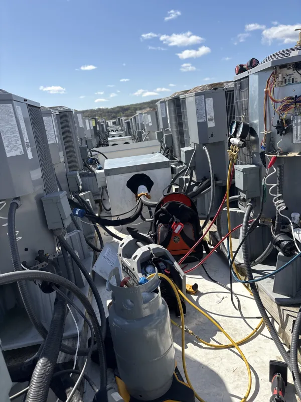 reinstalled all new units on this condos 58 units roof