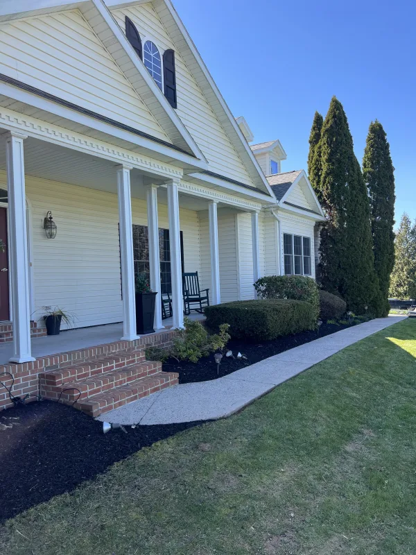 Trimmed bushes , and laid mulch
