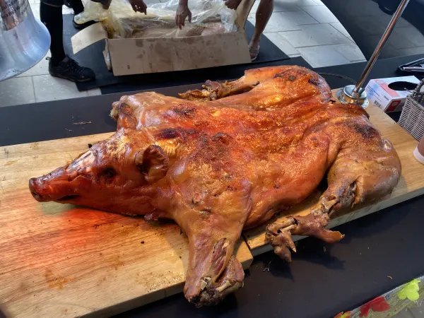 Whole pig underground roast 