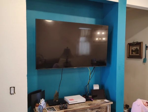 Painted the backdrop teal and hung the tv
