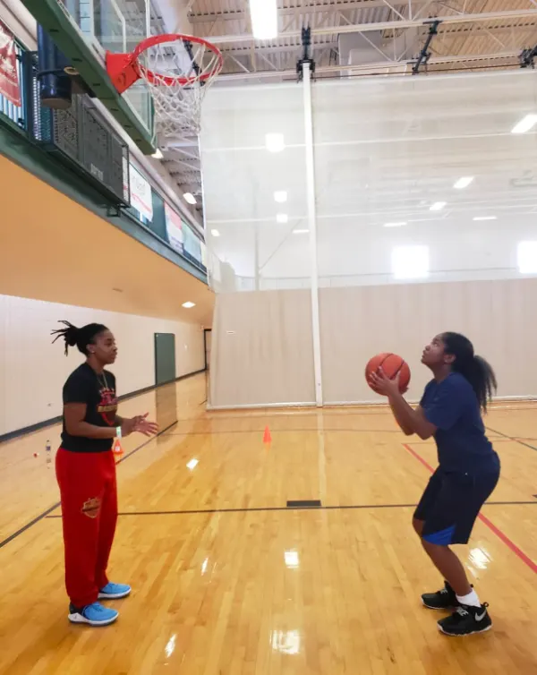 Working on shooting form with Noelle