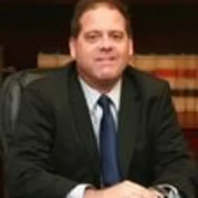 Ronald R. Tomlins, Esq.