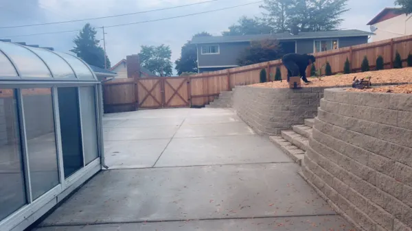 Retaining wall and concrete slab