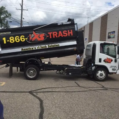 1-866-XS-TRASH & Motorcity Dumpster