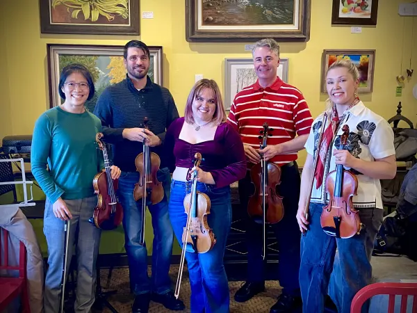 Adult students holiday performance at Zoe's Coffee 