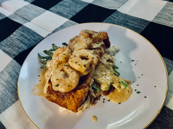 salmon and shrimp over mashed with cream sauce