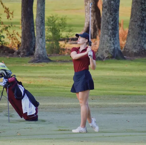 Competing on the Elon golf team