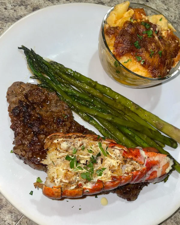 Steak and lobster surf and turf with asparagus