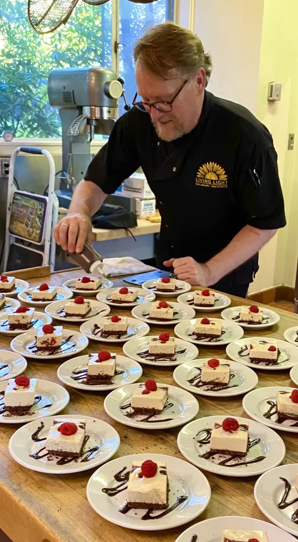 Plating White Chocolate Raspberry Cheesecakes