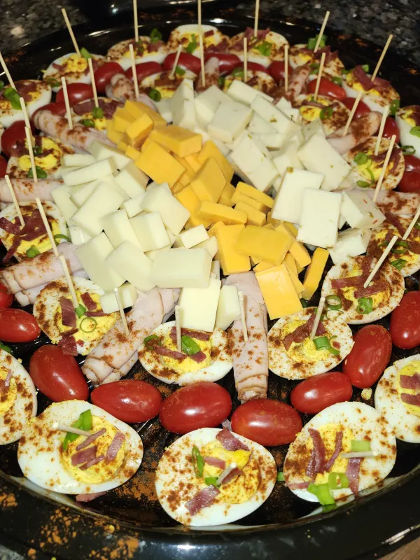 Meat and cheese platter with deviled eggs