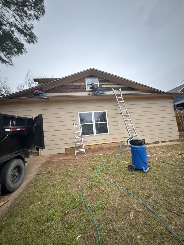 Getting that siding up!