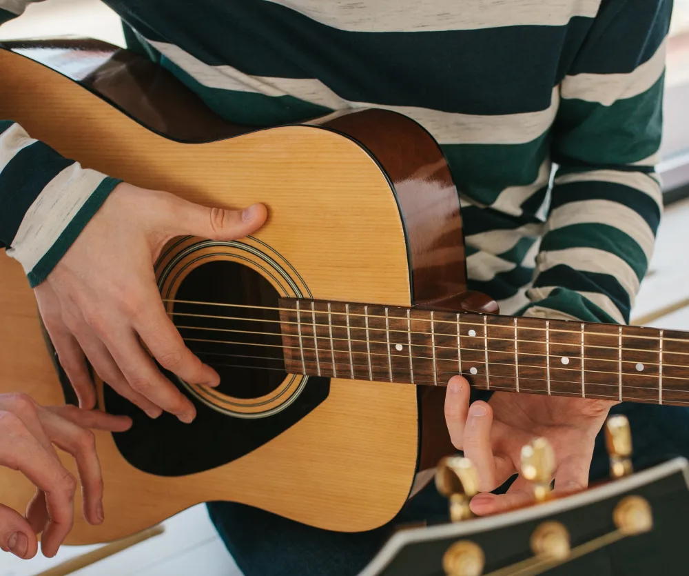 Holly's Guitar School For Kids