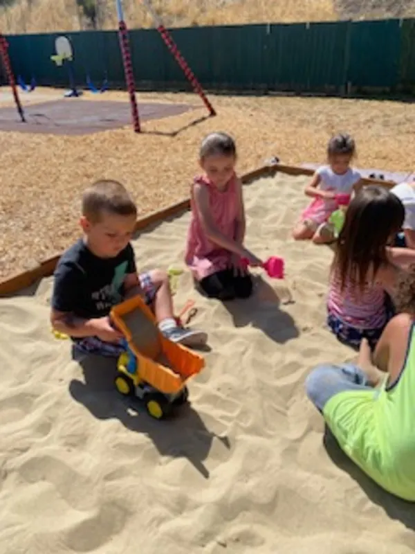 playing in the sun and sand