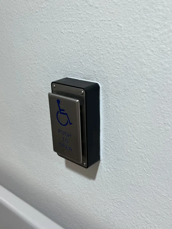 Finish caulking / paint around button