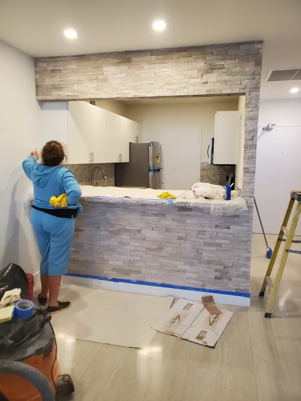 Covering of the breakfast area with marble stones