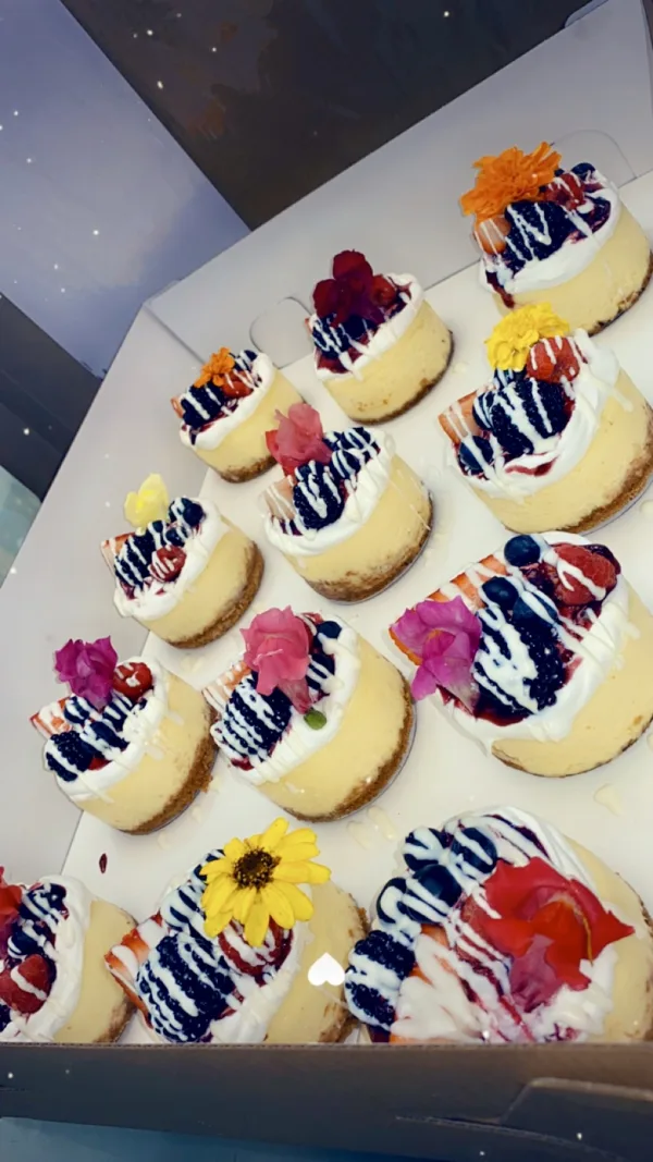 Individual cheesecakes with edible flowers