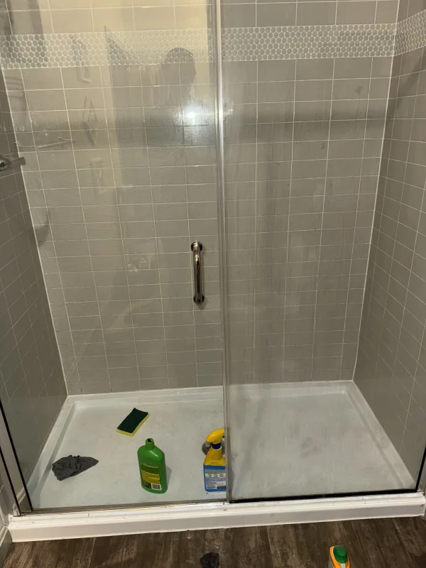 Shower door mildew clean side by side