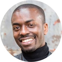 A portrait photo of James Aladiran