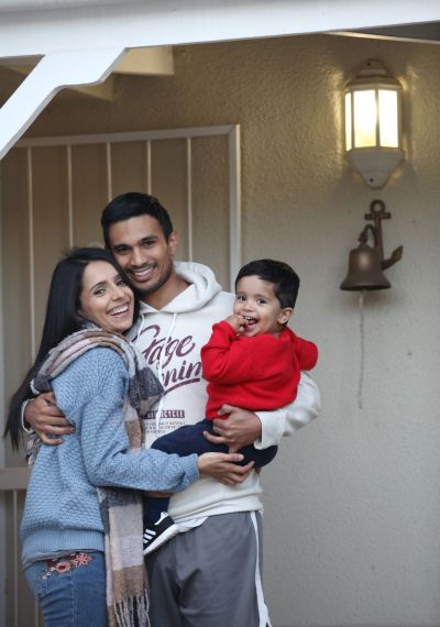 The Govendor family at their front door during the lock down.