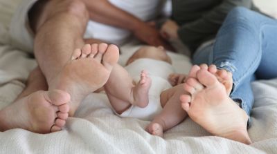 Feet of a family taken during a family photo session.