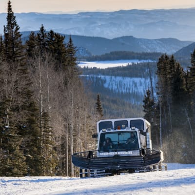 Eagle Point Resort | Sunset Snowcat Excursion photo