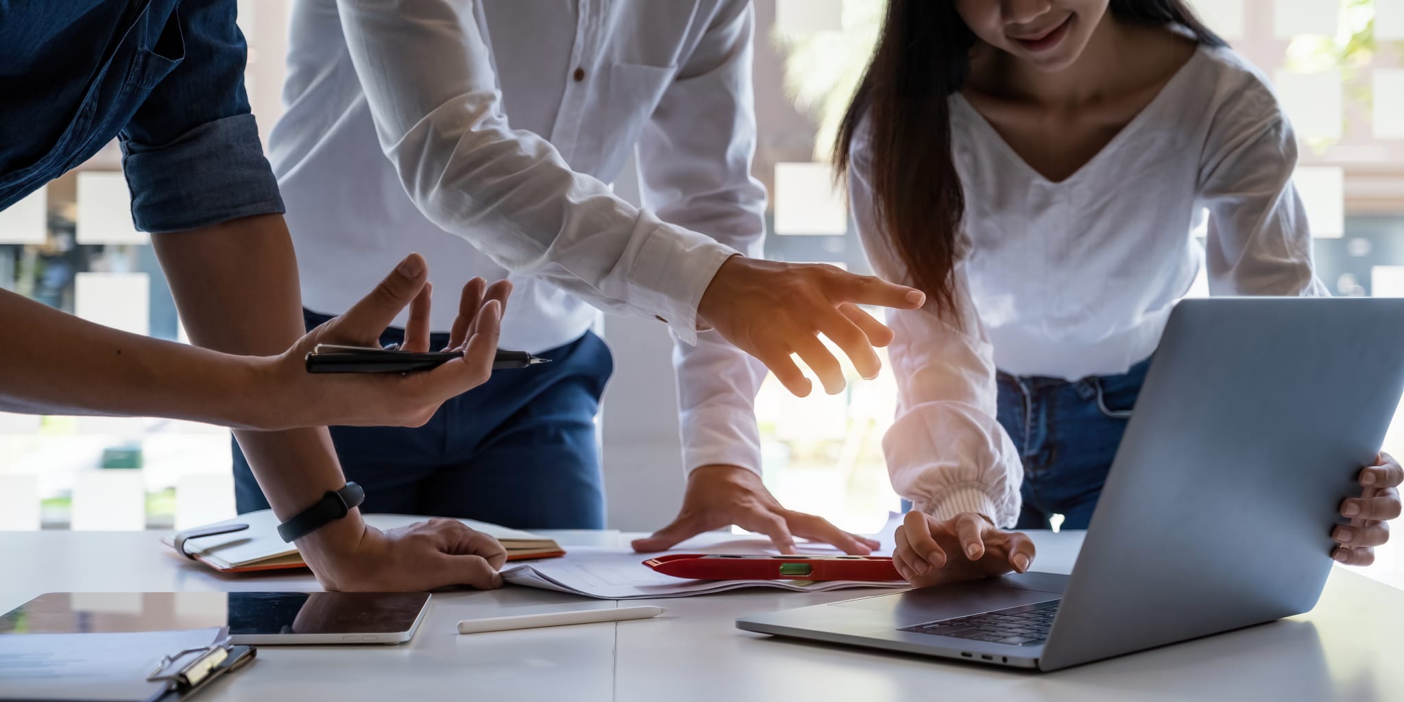 Analytics intelligence concept. Group of business people discuss current financial and economic on laptop for investment at the meeting. Analytics intelligence concept. Group of business people discuss current financial and economic on laptop for investment at the meeting