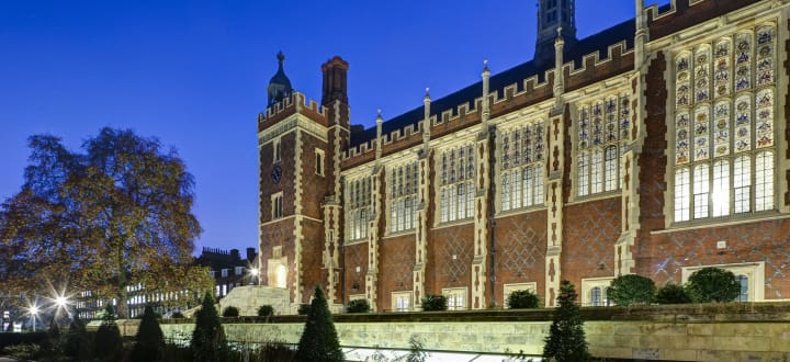 Exterior of the Treasury Building (Great Hall) lit up at dusk