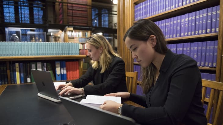 People studying in the Lincoln's Inn library