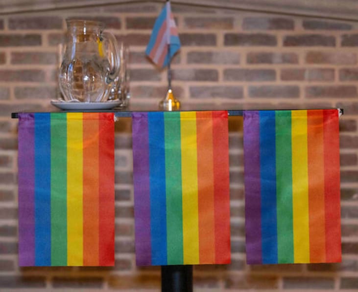 Pride flags in the MCR