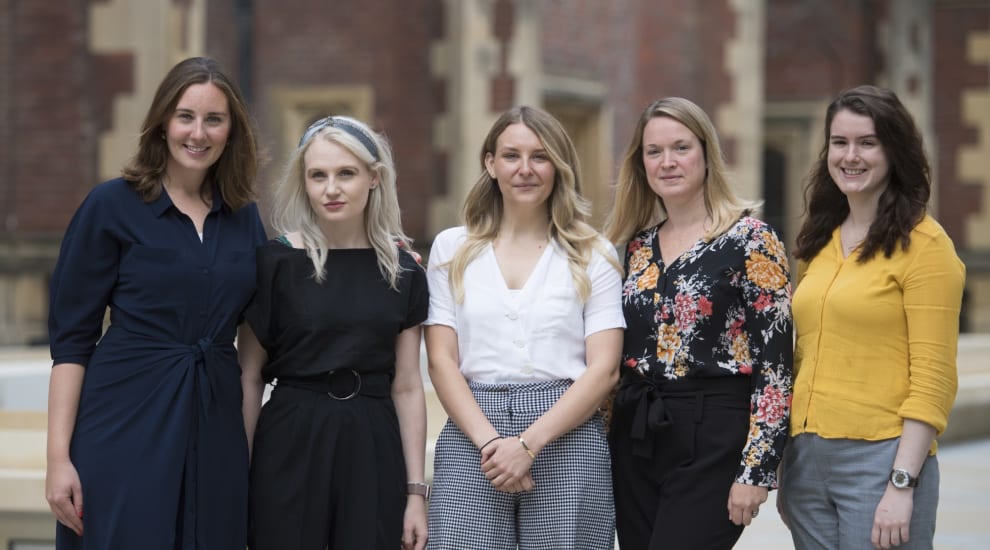 Five members of our sales and events team standing in front of historic venue