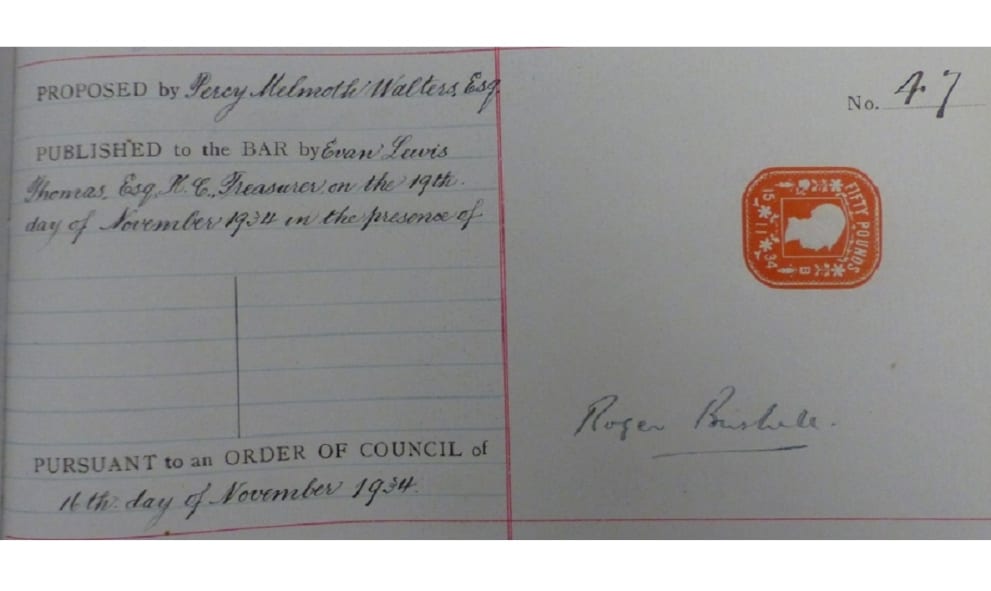 Text on lined paper with a red stamp