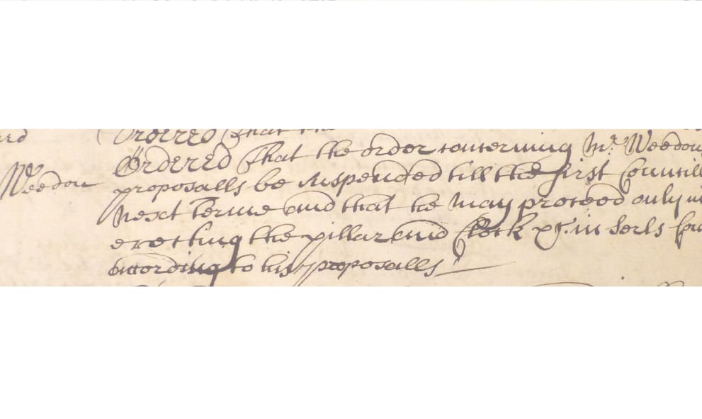 Hand written text in a cursive script on a yellowing piece of parchment