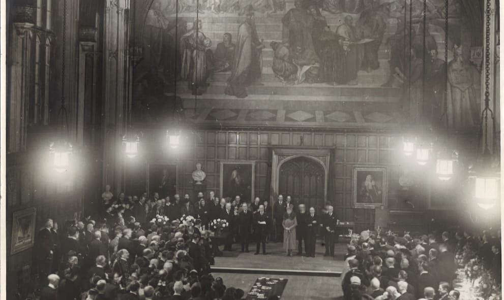 Photograph of Queen Mary in the Great Hall at Lincoln's Inn, following her tree planting ceremony
