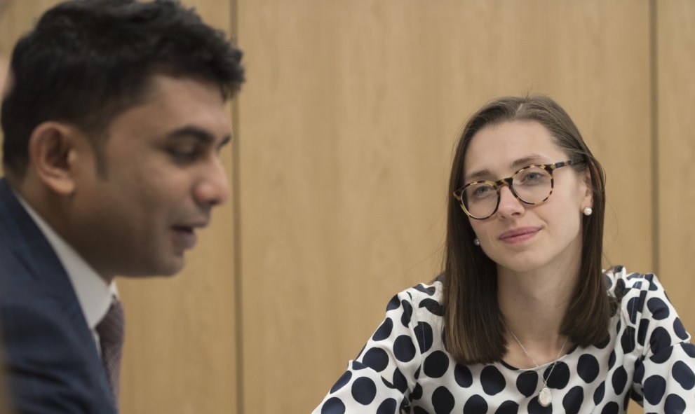 A man and woman in a meeting in the Ashworth Centre