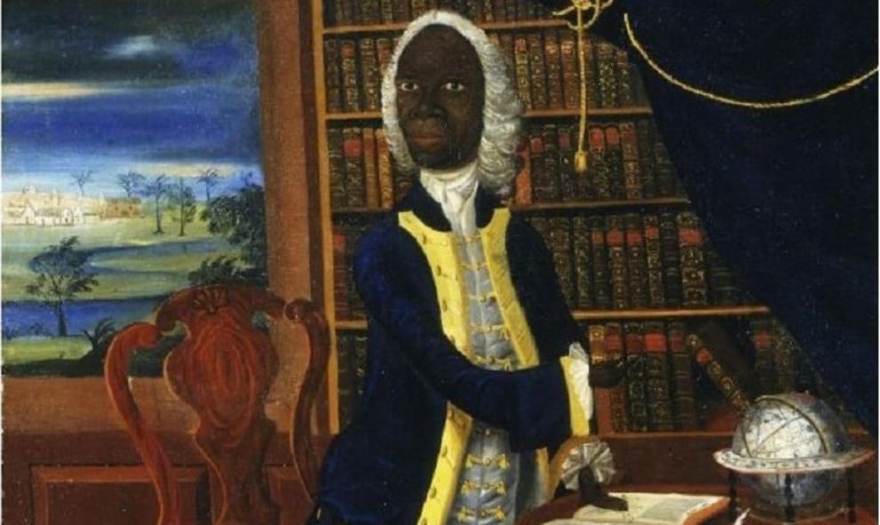 Painting of Francis Williams. He is a Black man, dressed in a white barrister's wig, and navy robes with gold lapels. He is depicted as standing before an open book on a wooden desk.