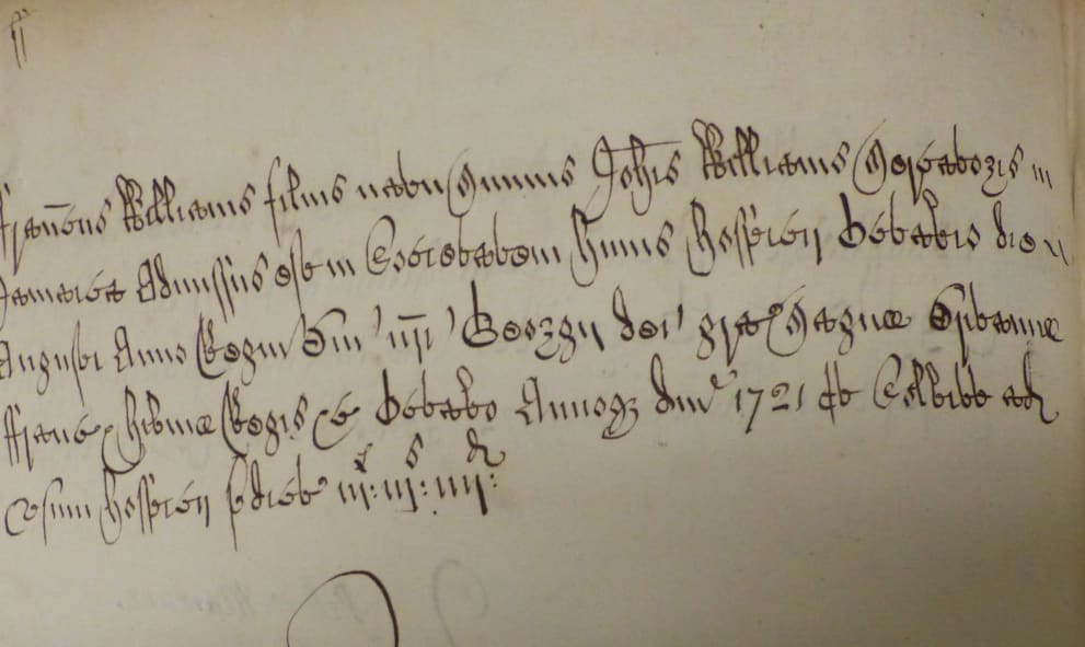Cursive handwriting on yellowing paper