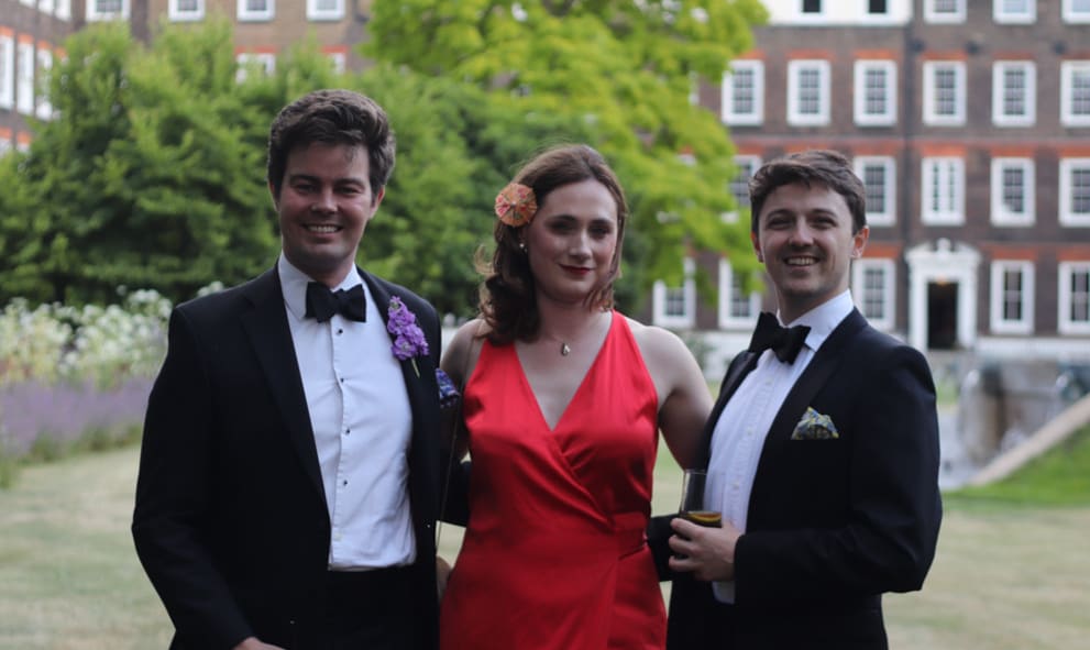 Three members in New Square during the Junior Members Summer Dinner 2024