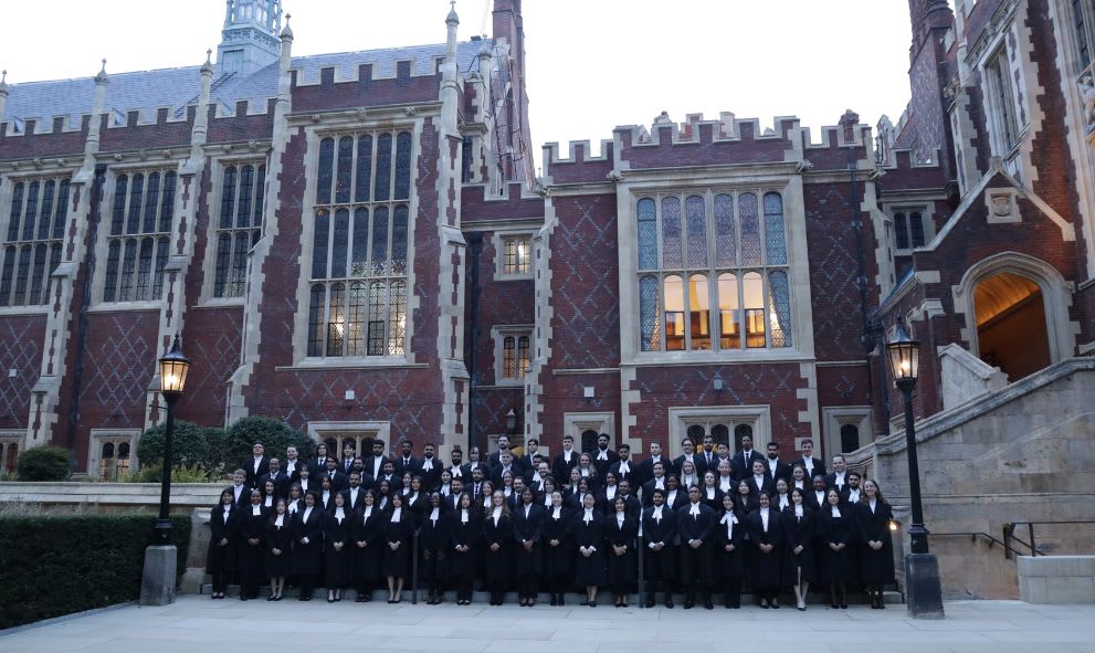 Group photo of students after their Call Ceremony on the stairs outside of the Treasury Office.
