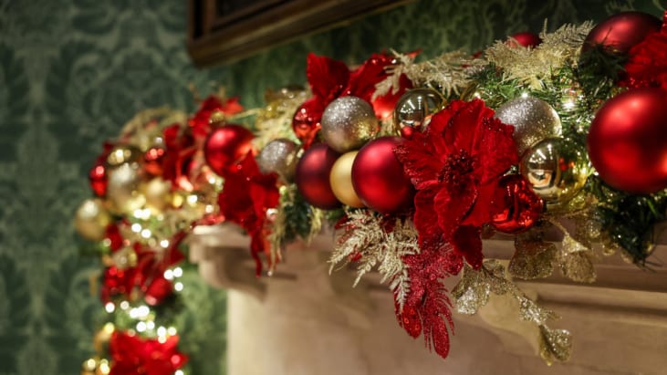 Red and gold Christmas garland on the fireplace in the OCR