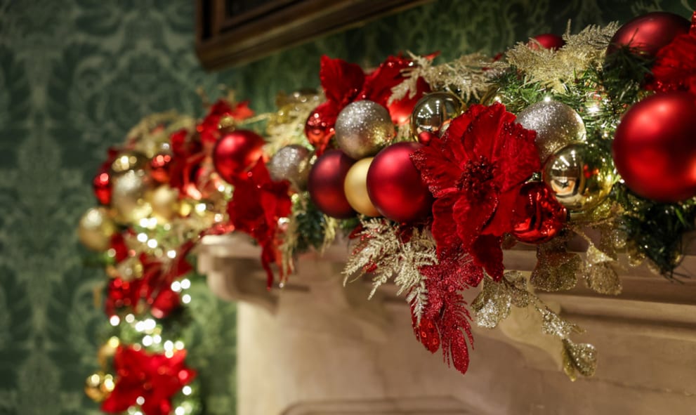 Red and gold Christmas garland on the fireplace in the OCR